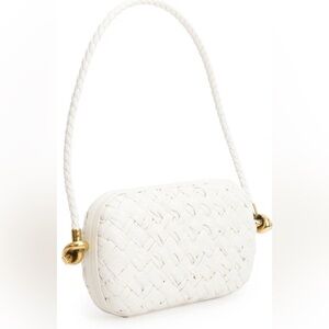 Bottega Veneta White Woven Intreccio mini bag retails for $5,000.